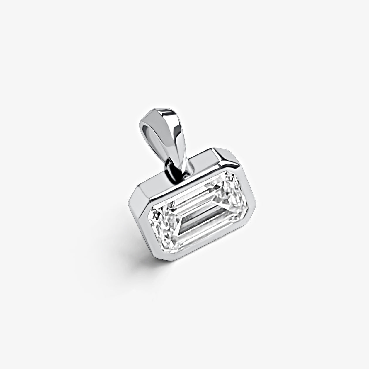 Emerald East-West Bezel Solitaire Pendant
