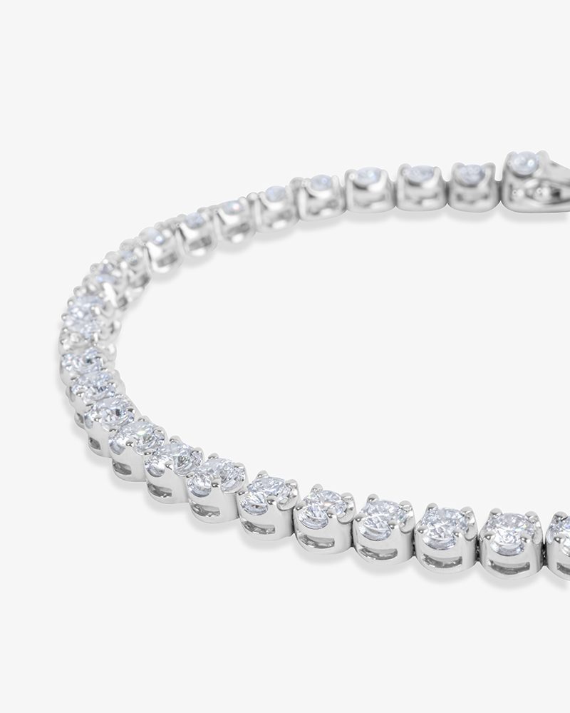 Four Prong Half Bezel Diamond Tennis Bracelet